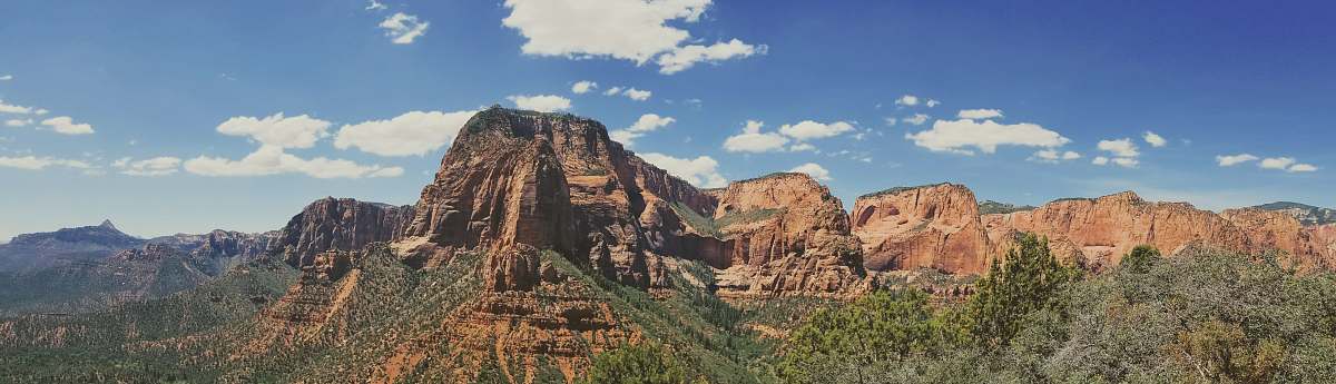 mountain panoramic view of green mountains crest